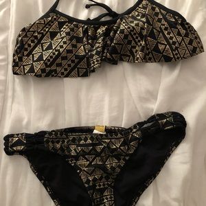 Gold and black bikini